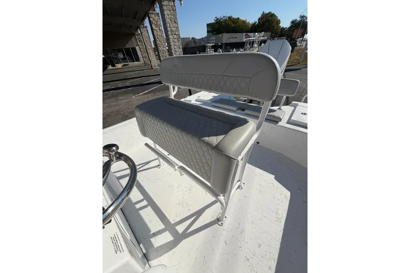 Slide: The Image of 2026 Blazer Bay 2400 boat seat with gray upholstery and diamond stitching. - 17