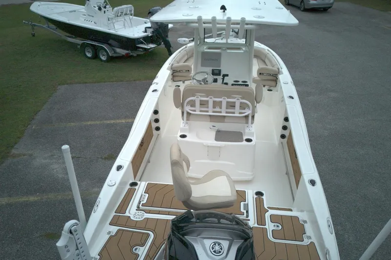 Slide: The Image of 2022 NauticStar 251 Hybrid boat with spacious deck and modern console. - 10