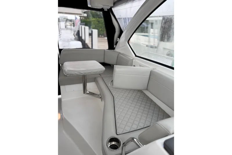 Slide: The Image of 2025 Pursuit OS 325 Offshore boat interior with sleek seating and modern design. - 30