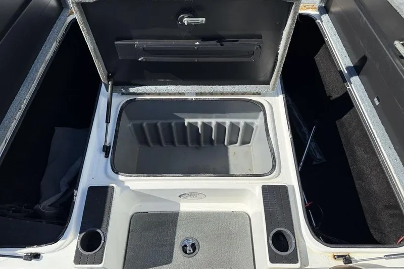 Slide: The Image of Humminbird Helix 10 fish finder on 2005 Triton TR-21 boat dashboard. - 12