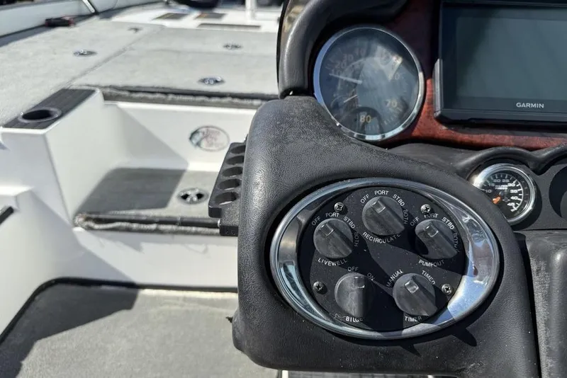Slide: The Image of Dashboard of a 2005 Triton TR-21 boat with Garmin GPS and gauges. - 16