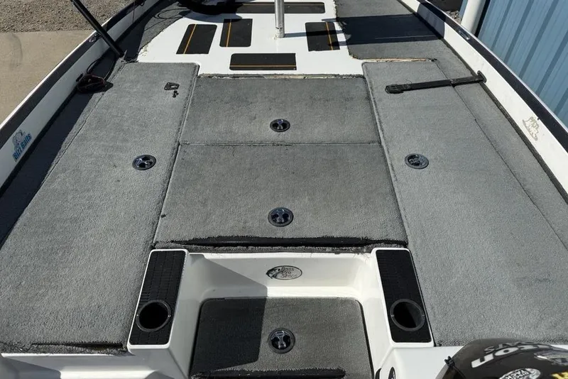 Slide: The Image of Minn Kota i-Pilot trolling motor on 2005 Triton TR-21 boat, outdoor setting. - 5