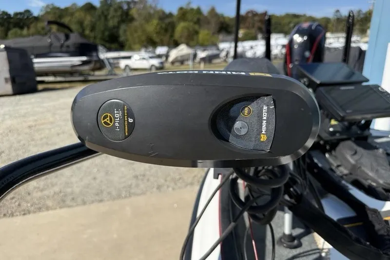 Slide: The Image of 2005 Triton TR-21 boat deck with fishing equipment and electronics. - 6