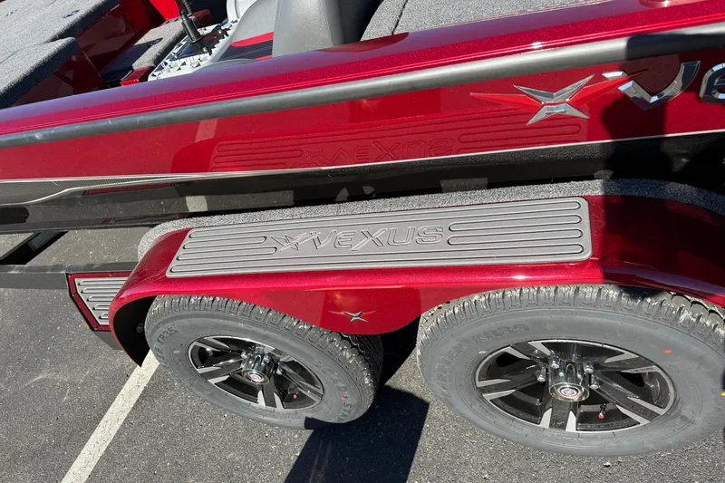 Slide: The Image of 2026 Vexus AVX1980 boat trailer with red finish and branded wheels. - 4