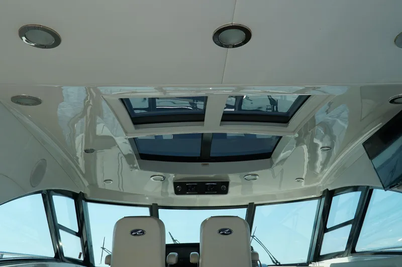 Slide: The Image of Interior view of 2014 Sea Ray 540 Sundancer yacht with skylight and modern design. - 10