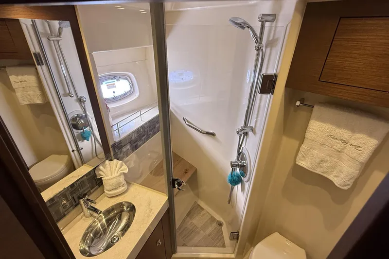 Slide: The Image of Luxurious bathroom in 2014 Sea Ray 540 Sundancer yacht with shower and sink. - 17