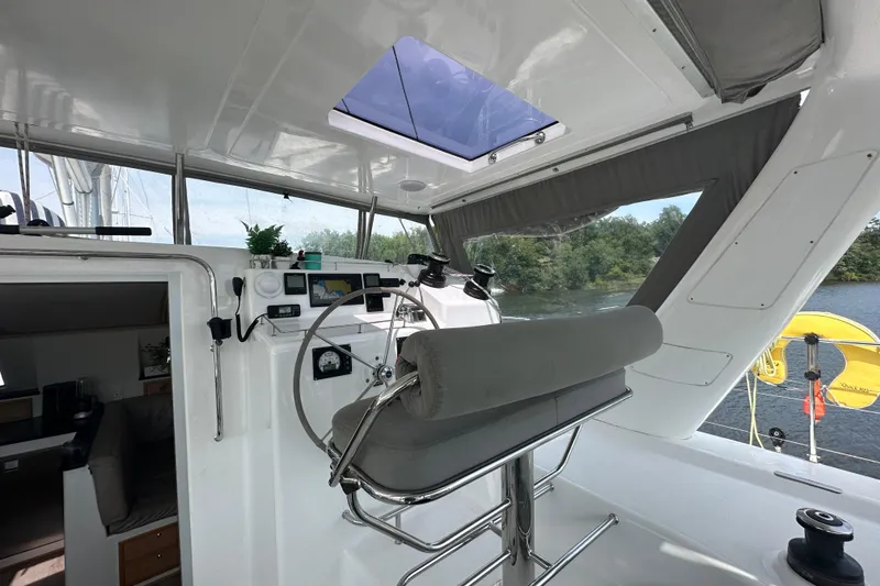 Slide: The Image of Cockpit of 2021 Celtic Yachts 40, featuring steering wheel and navigation equipment. - 19