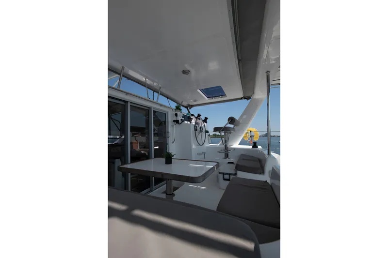 Slide: The Image of Modern interior of 2021 Celtic Yachts 40, featuring sleek seating and a dining area. - 37