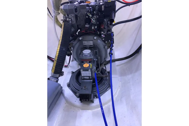 Slide: The Image of Engine compartment of a 2021 Celtic Yachts 40, featuring mechanical components and hoses. - 6