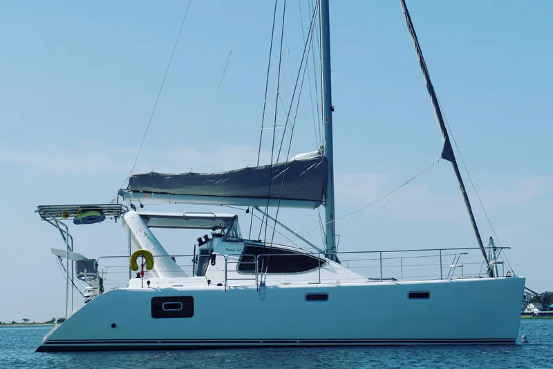 The Image of 2021 Celtic Yachts 40 sailboat on calm water under clear sky. - 0