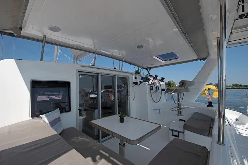 Slide: The Image of Spacious deck of 2021 Celtic Yachts 40 with seating and helm station. - 30