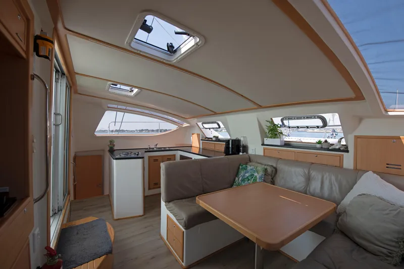 Slide: The Image of Luxurious interior of 2021 Celtic Yachts 40, featuring modern kitchen and comfortable seating area. - 40