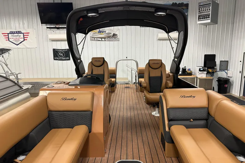Slide: The Image of 2025 Bentley Pontoons Elite 253 Admiral interior with luxurious seating and modern design. - 15