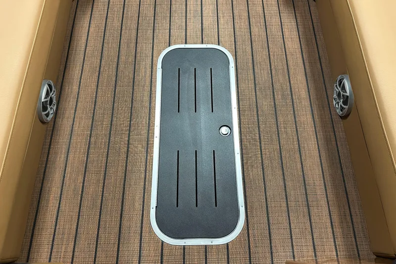 Slide: The Image of 2025 Bentley Pontoons Elite 253 Admiral deck with sleek hatch and speakers. - 19