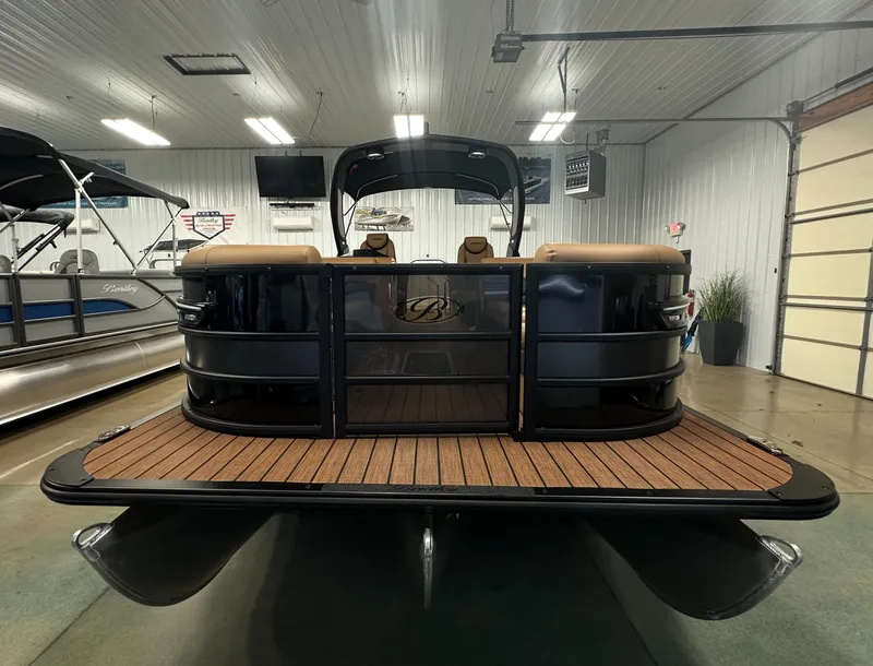 Slide: The Image of 2025 Bentley Pontoons Elite 253 Admiral in showroom, front view. - 5