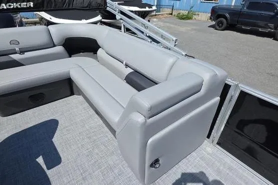 Slide: The Image of 2026 Sun Tracker PB 20 DLX pontoon boat with gray seating and spacious deck. - 21