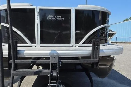 Slide: The Image of 2026 Sun Tracker PB 20 DLX pontoon boat on trailer, rear view. - 3