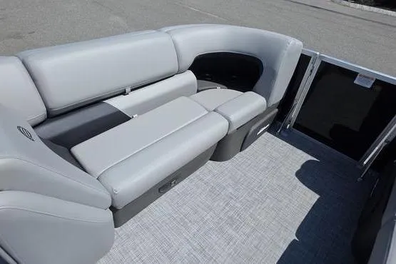 Slide: The Image of 2026 Sun Tracker PB 20 DLX pontoon boat with gray seating and spacious deck. - 8