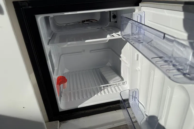 Slide: The Image of Open refrigerator inside a 2000 Formula 280 Sun Sport boat. - 20