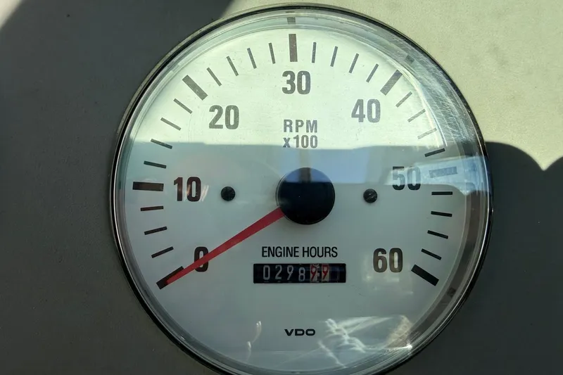 Slide: The Image of Tachometer of 2000 Formula 280 Sun Sport showing RPM and engine hours. - 30