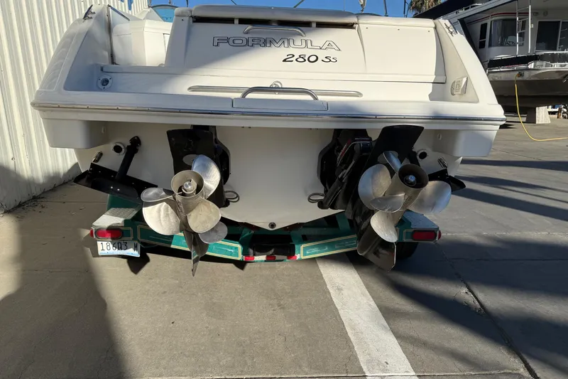 Slide: The Image of Rear view of a 2000 Formula 280 Sun Sport boat on a trailer. - 6