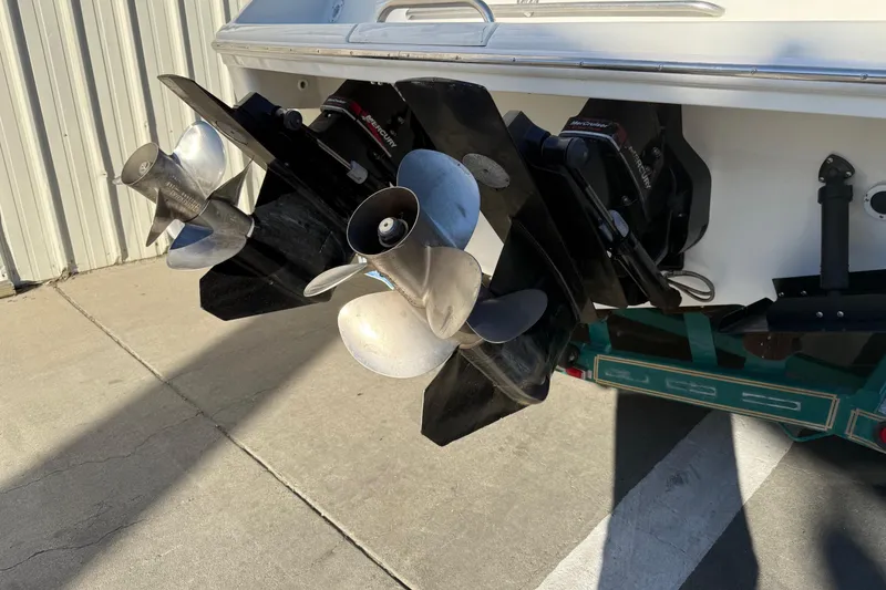 Slide: The Image of Propellers of a 2000 Formula 280 Sun Sport boat on a trailer. - 7