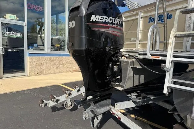 Slide: The Image of 2014 Harris FloteBote Sunliner 200 with Mercury 90 engine at dealership. - 23