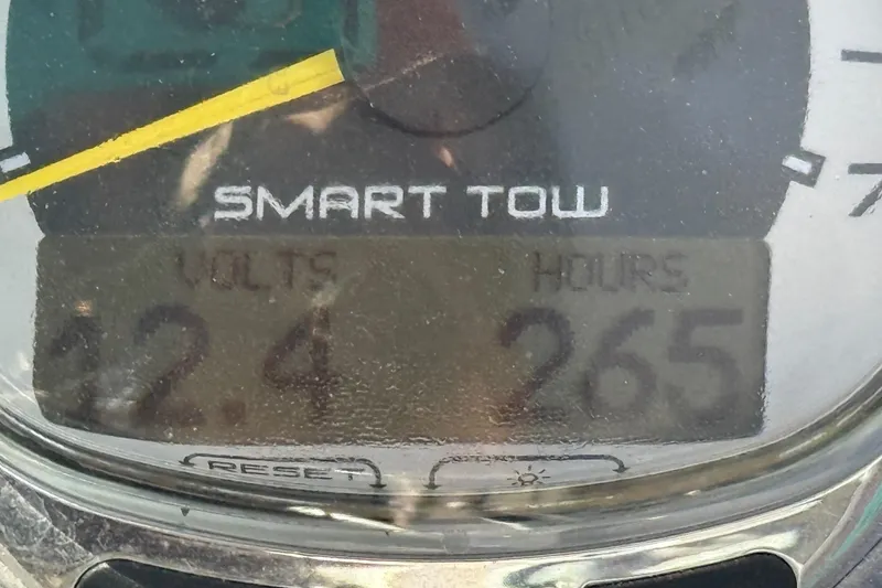 Slide: The Image of Luxurious 2011 Sea Ray 270 SLX boat interior with seating, table, and helm. - 10