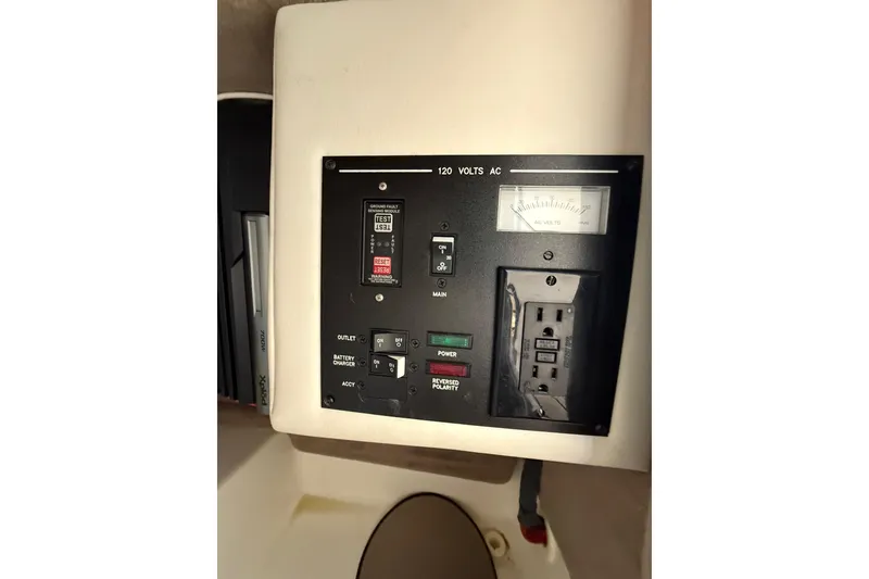 Slide: The Image of Interior of a 2011 Sea Ray 270 SLX boat with seating and table. - 20