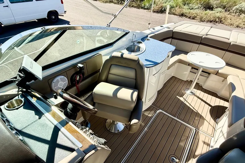 Slide: The Image of Interior view of a 2011 Sea Ray 270 SLX boat showing control panel and wiring. - 26