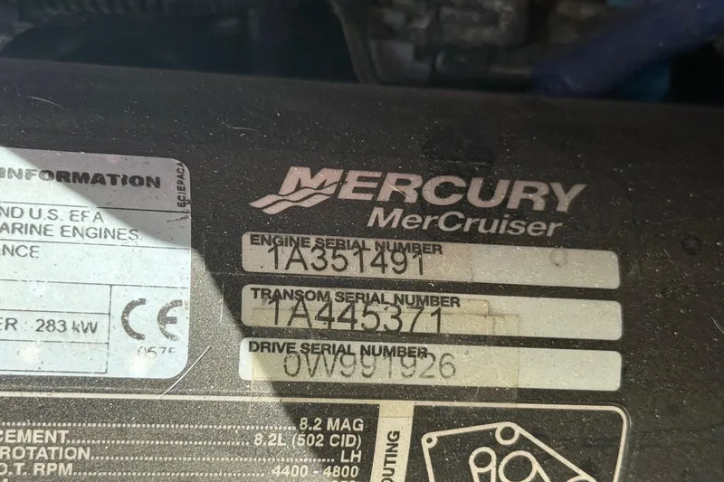 Slide: The Image of Interior of 2011 Sea Ray 270 SLX boat with storage and electrical components. - 30