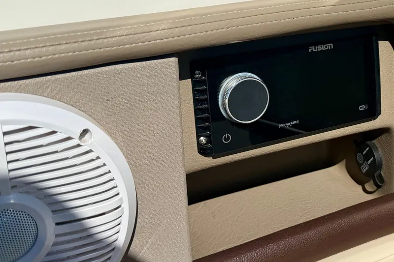 Slide: The Image of Close-up of Sea Ray 270 SLX 2011 gauge showing 12.4 volts and 265 hours. - 37