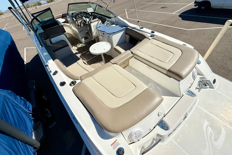 Slide: The Image of Interior view of a 2011 Sea Ray 270 SLX boat cockpit with dashboard and controls. - 7