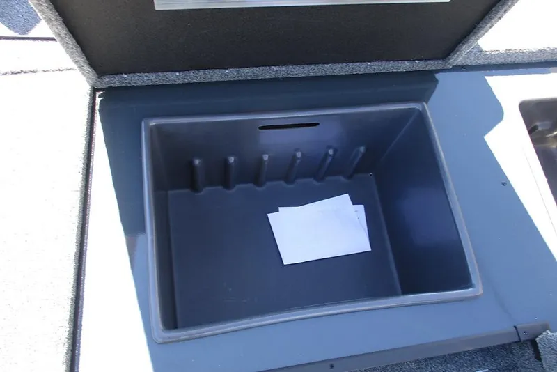 Slide: The Image of 2026 Ranger RT178 boat storage compartments with open lids, showcasing interior space. - 11