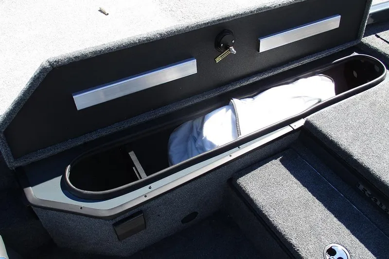 Slide: The Image of 2026 Ranger RT178 boat storage compartment with open lid and visible interior. - 14