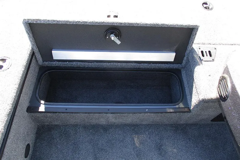 Slide: The Image of 2026 Ranger RT178 boat deck with carpeted storage compartments and metal latches. - 16