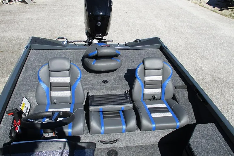 Slide: The Image of 2026 Ranger RT178 boat storage compartment with gray carpet interior. - 18