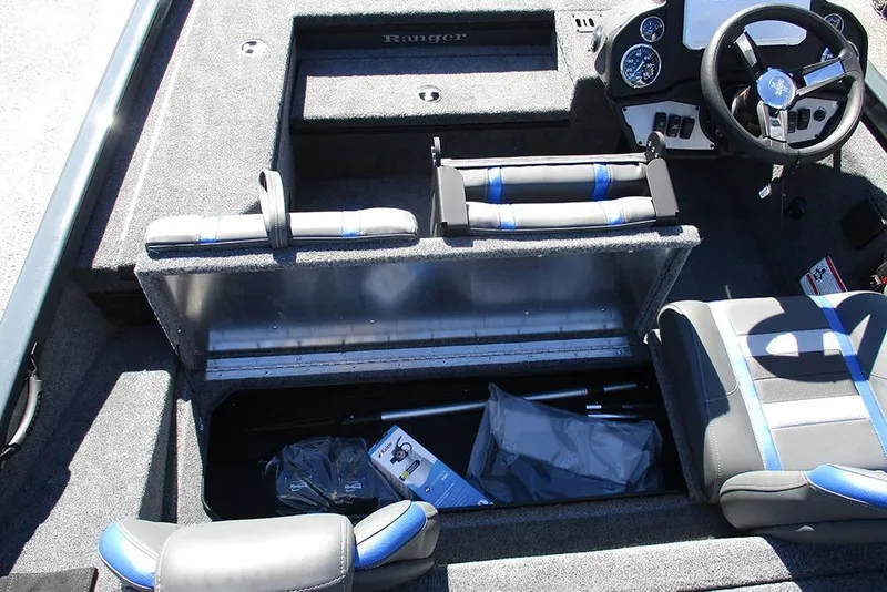Slide: The Image of 2026 Ranger RT178 boat interior with gray and blue seating and steering wheel. - 20