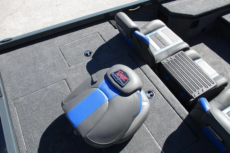Slide: The Image of 2026 Ranger RT178 boat storage compartment with seats and fishing gear. - 22