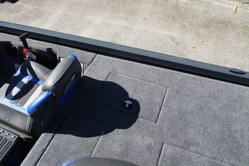 Slide: The Image of 2026 Ranger RT178 boat interior with gray and blue seating and storage compartments. - 24