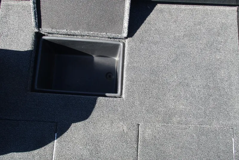 Slide: The Image of 2026 Ranger RT178 boat storage compartment with open lid, showcasing interior space. - 26