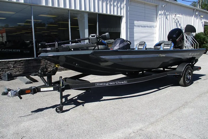 Slide: The Image of 2026 Ranger RT178 boat with Mercury engine on trailer outside dealership. - 3