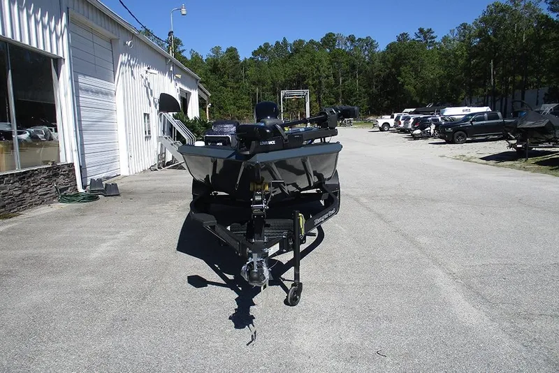 Slide: The Image of 2026 Ranger RT178 boat on trailer outside dealership. - 4