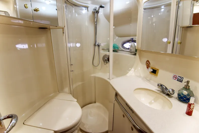 Slide: The Image of Luxurious bathroom in 2000 Sea Ray 450 Express Bridge yacht with shower and vanity. - 21