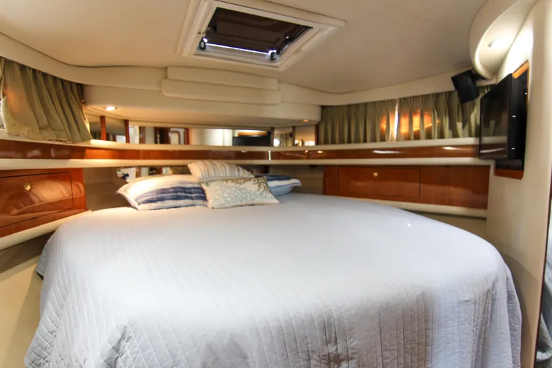 Slide: The Image of Luxurious bedroom interior of 2000 Sea Ray 450 Express Bridge yacht. - 22