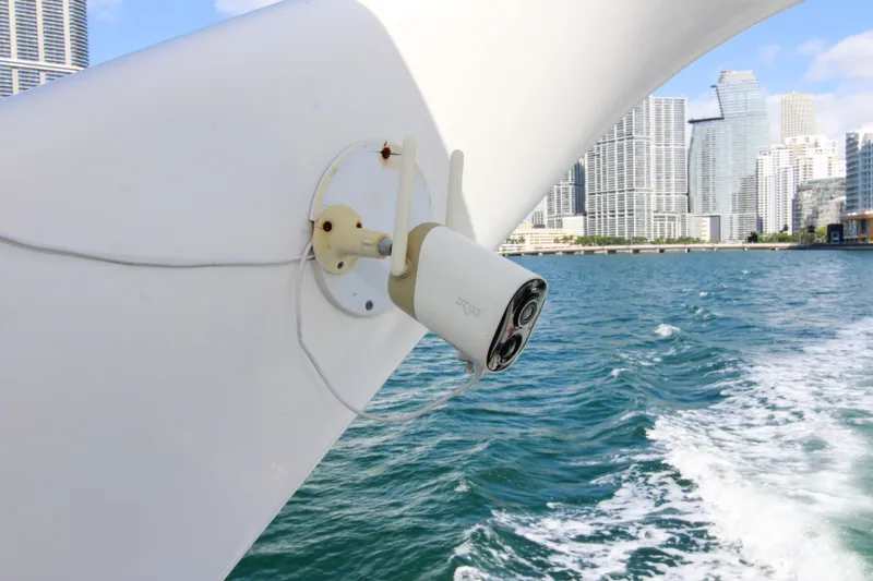 Slide: The Image of Security camera on 2000 Sea Ray 450 Express Bridge, city skyline in background. - 43