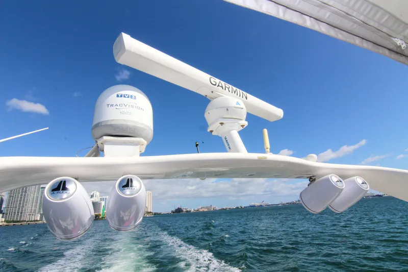 Slide: The Image of Sea Ray 450 Express Bridge 2000 with Garmin and TracVision equipment on open water. - 44