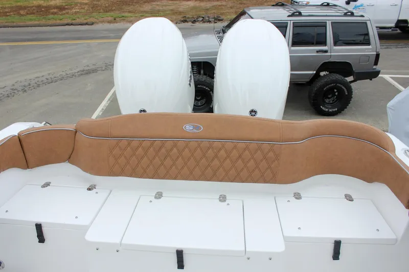 Slide: The Image of Luxurious seating on 2026 Sea Hunt Ultra 265 SE boat with diamond-stitched upholstery. - 34
