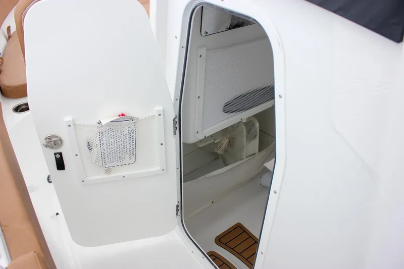 Slide: The Image of 2026 Sea Hunt Ultra 265 SE boat, featuring sleek design and modern canopy. - 43