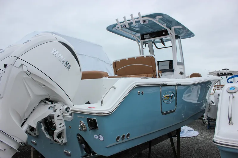 Slide: The Image of 2026 Sea Hunt Ultra 265 SE boat roof with rod holders and speakers. - 59